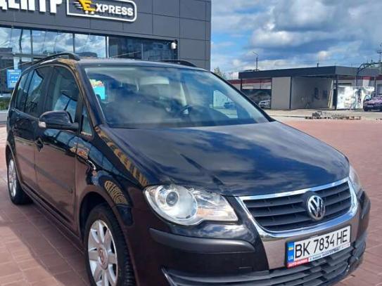 Volkswagen Touran
                          2007г. в рассрочку