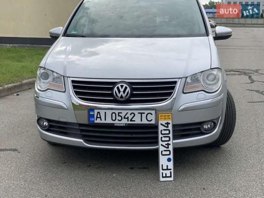 Volkswagen Touran
                          2010г. в рассрочку