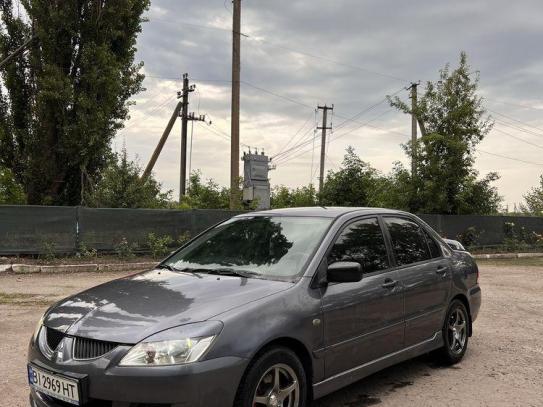 Mitsubishi Lancer                          2004г. в рассрочку