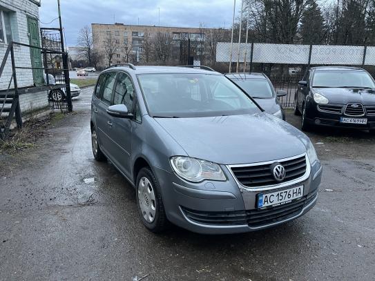 Volkswagen Touran
                          2009г. в рассрочку