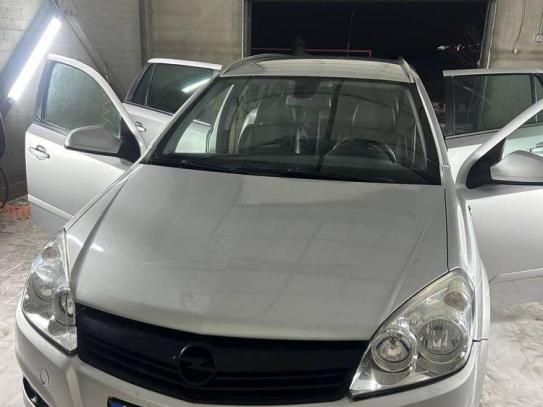 Opel Astra                           2009г. в рассрочку