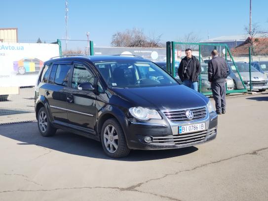 Volkswagen Touran                          2007г. в рассрочку