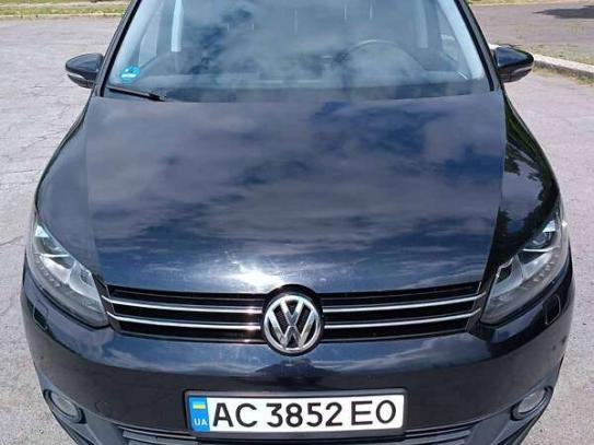 Volkswagen Touran                          2014г. в рассрочку