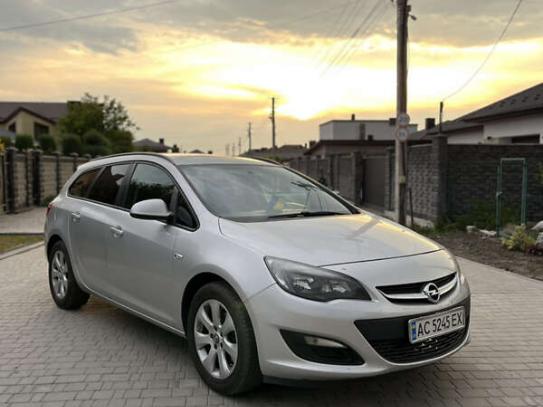 Opel Astra                           2013г. в рассрочку