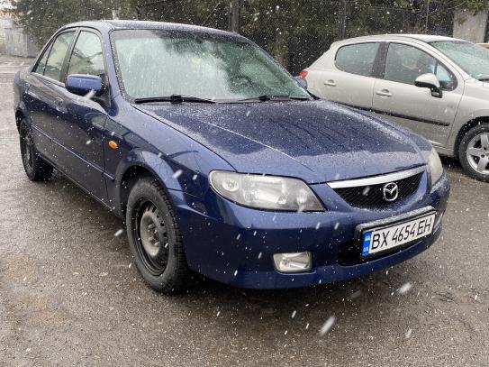 Mazda 323                             2003г. в рассрочку