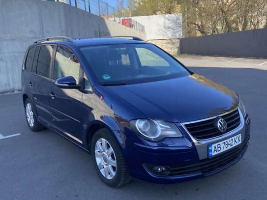 Volkswagen Touran
                          2009г. в рассрочку