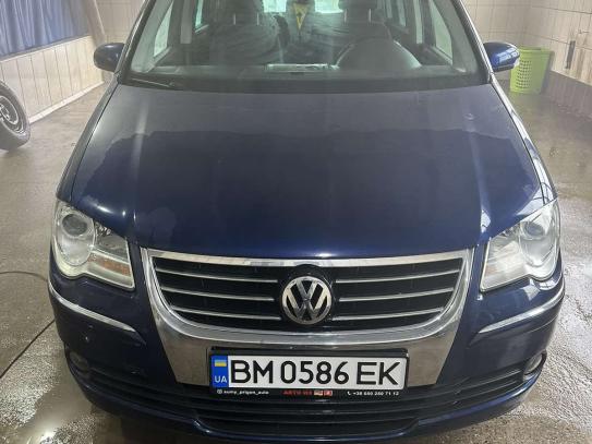 Volkswagen Touran
                          2007г. в рассрочку