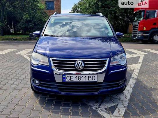 Volkswagen Touran
                          2009г. в рассрочку